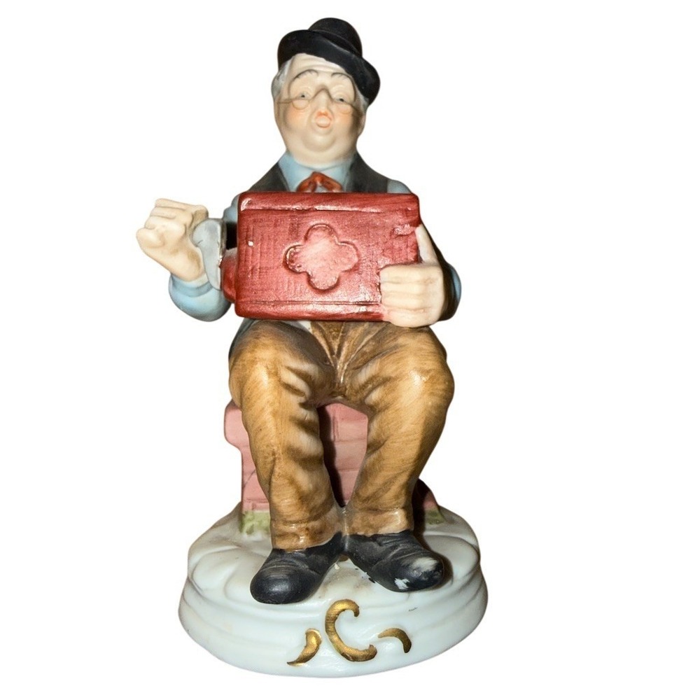 Vintage Porcelain Figurine Seated Gentleman Bowler Hat Red Book Bench